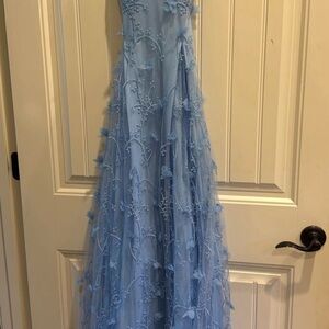 Elegant Blue Gown with Floral Embellishments